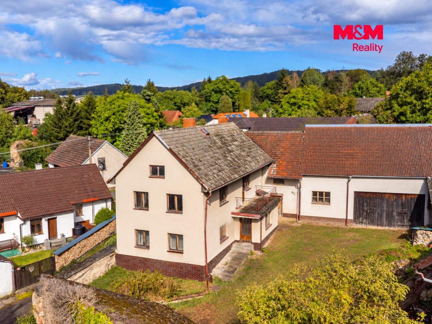 wide_daylight_aerial_upper_angle_view_of_a_rural_v.png