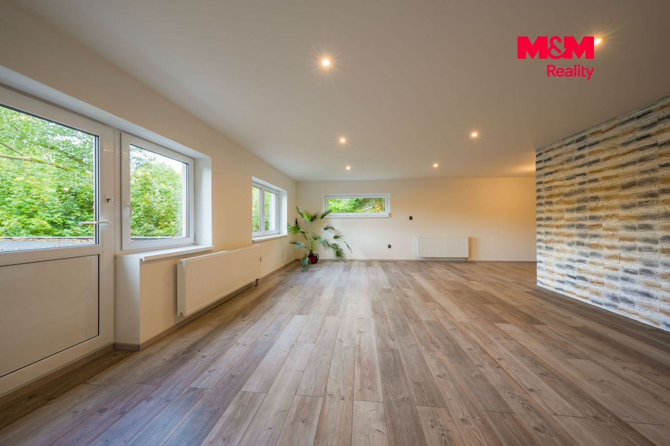 Obývací pokoj s kuchyňským koutem bytu 2+kk  75 m² 