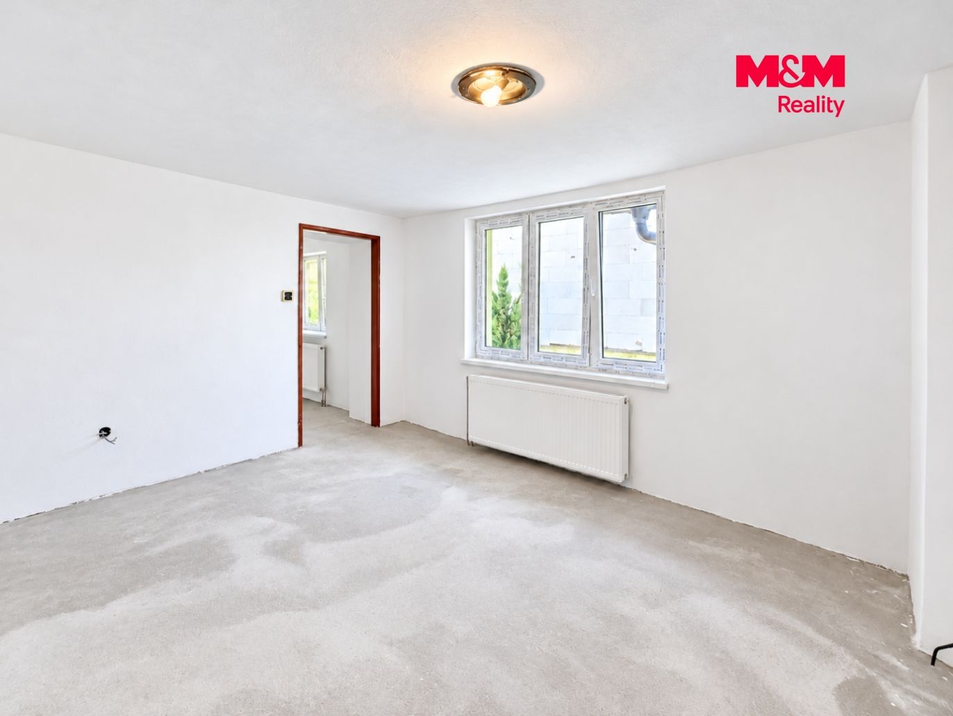 Bright Unfinished Room with Windows.png