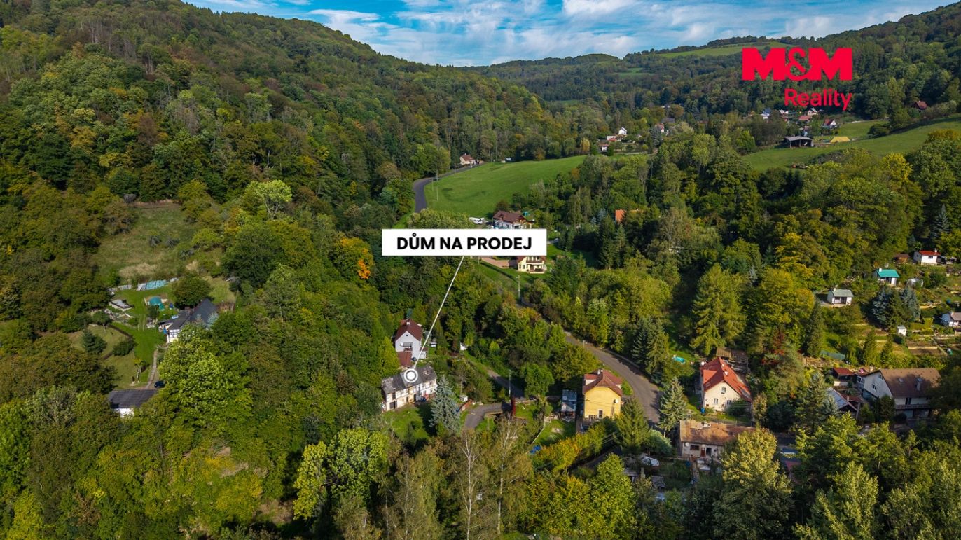 pozemek s domem