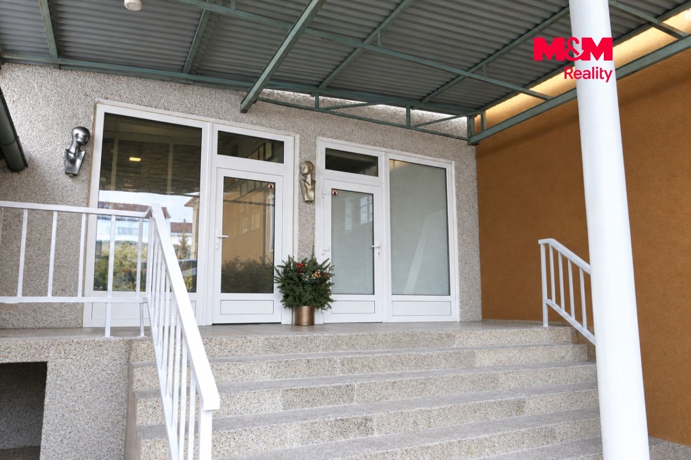 Elegant Entrance with Glass Doors.png