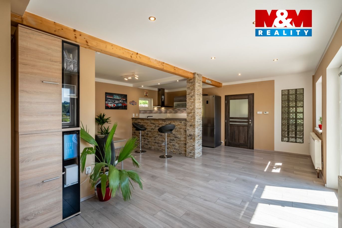 Obývací pokoj s kuchyňským koutem bytu 2+kk 108 m² 