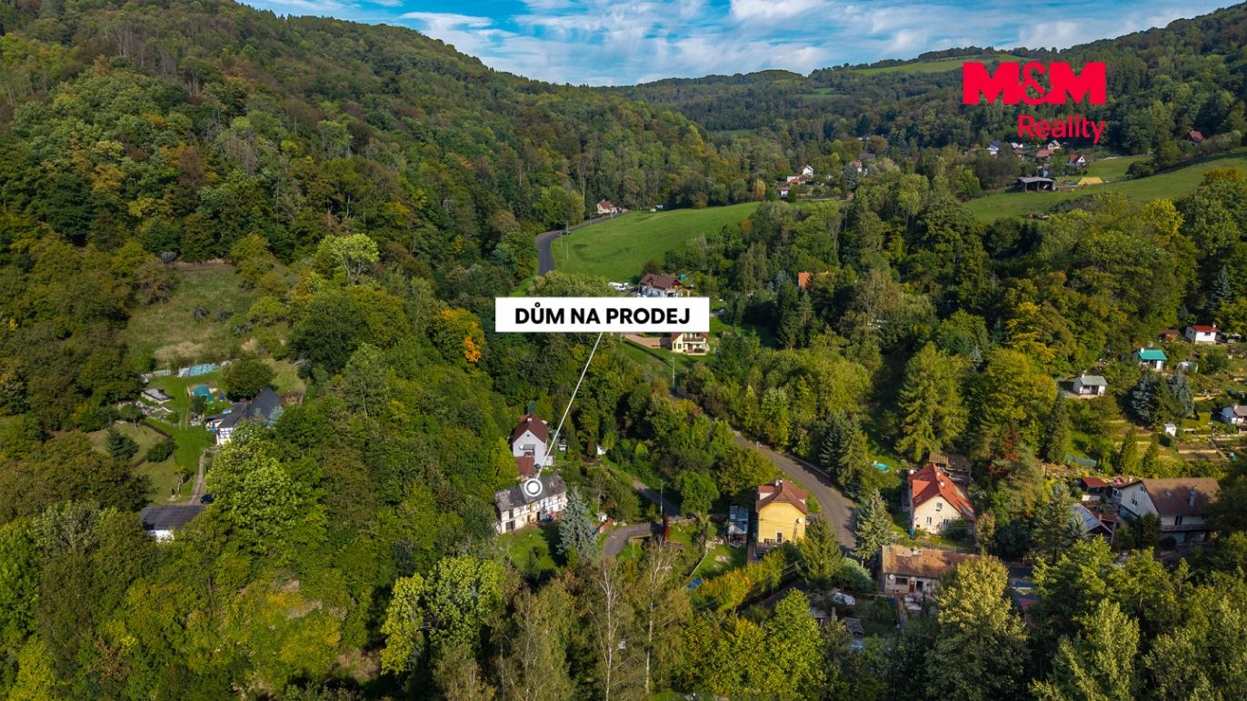 pozemek s domem