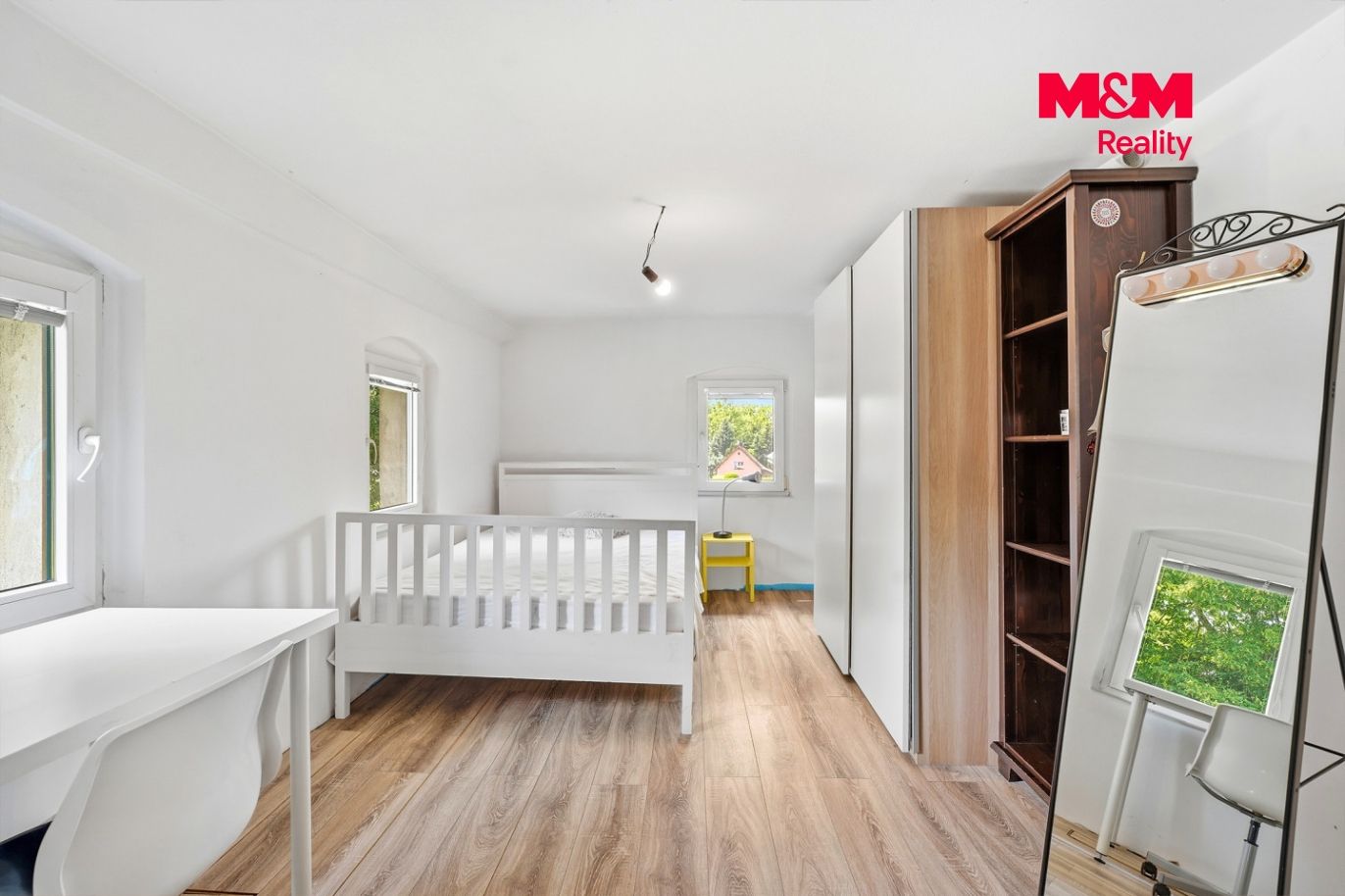 apartmán v patře včetně KK