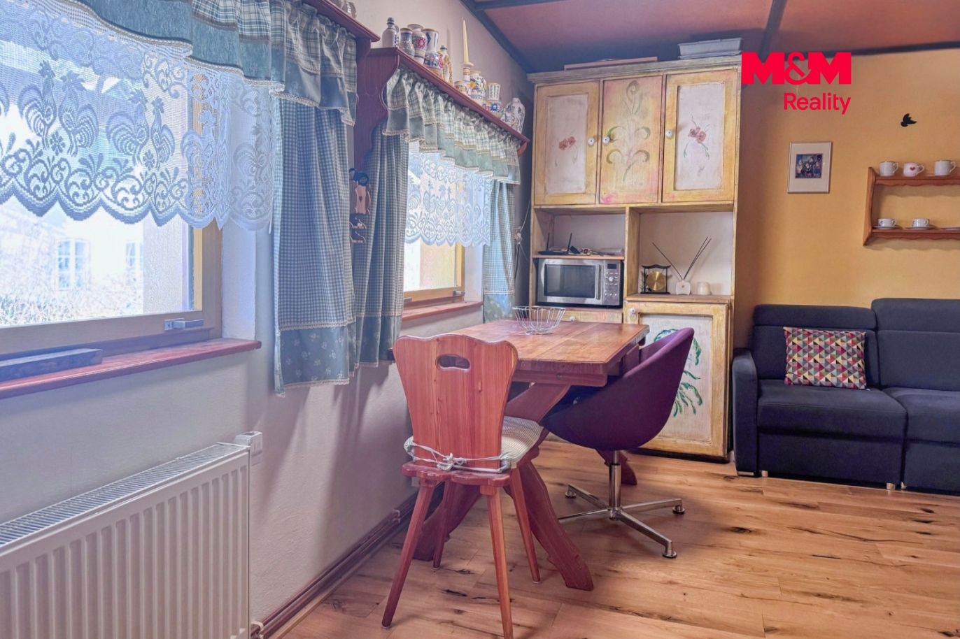 Obývací pokoj s kuchyňským koutem