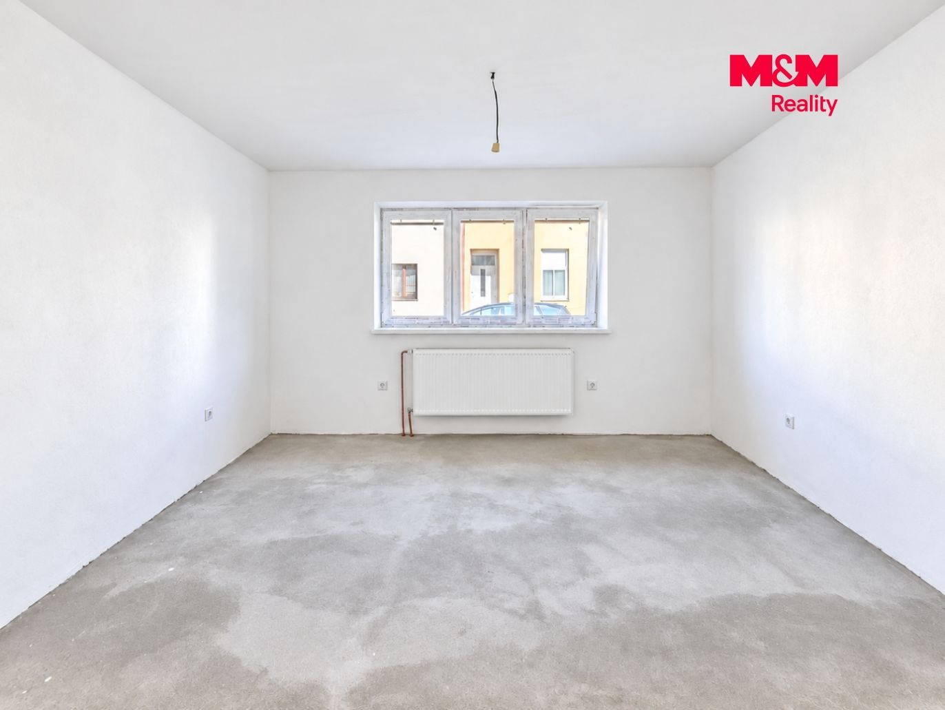 Bright Unfinished Room with Triple Window.png