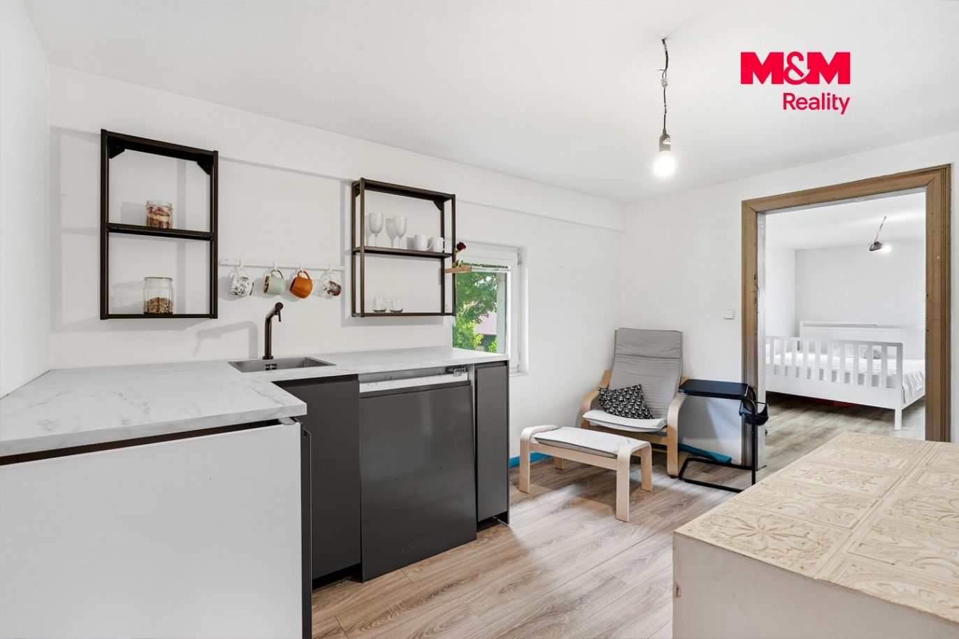 apartmán v patře včetně KK