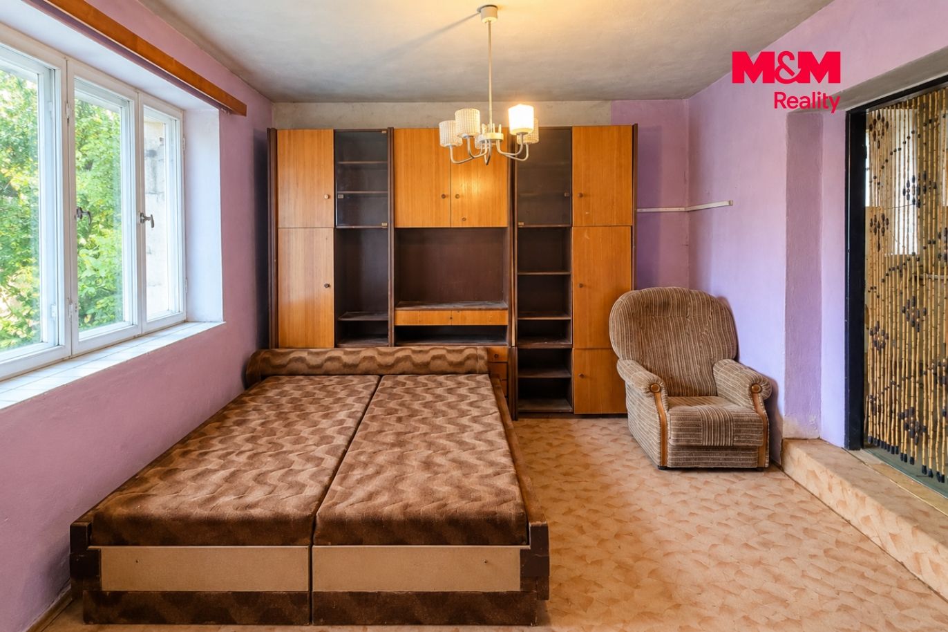 Retro bedroom with vintage wall unit.png