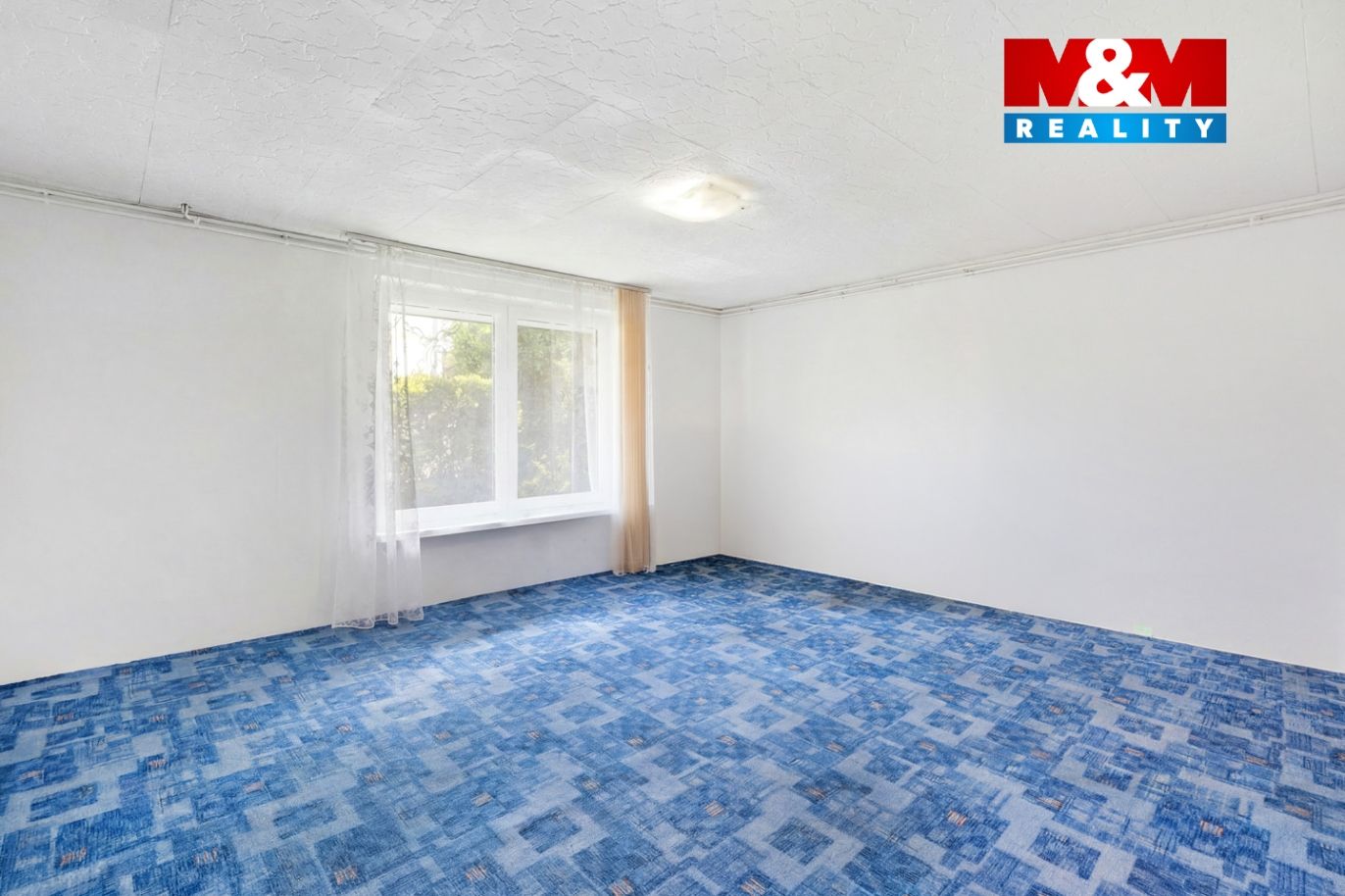 původní garáž nyní místnost