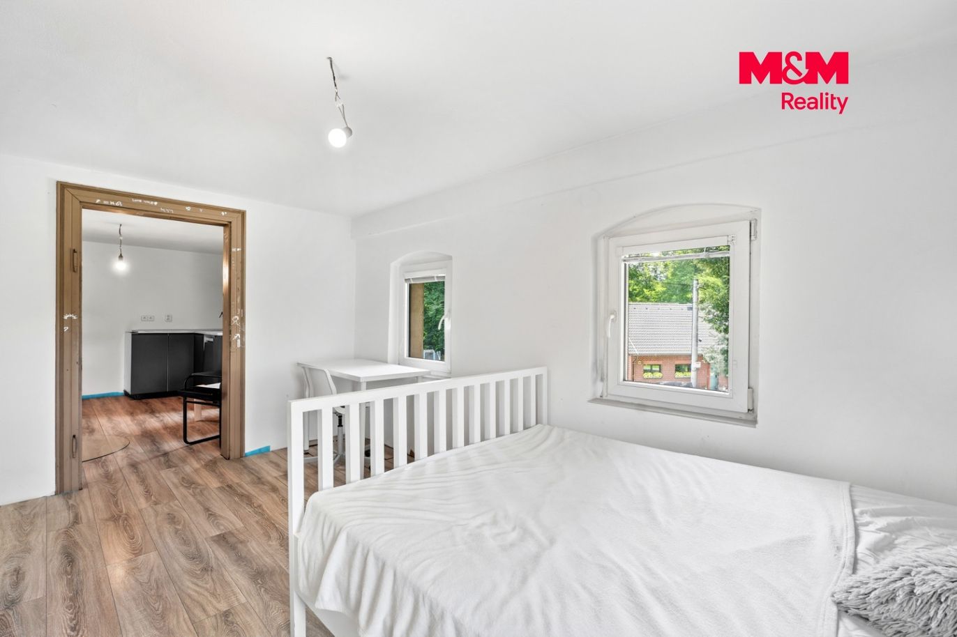 apartmán v patře včetně KK