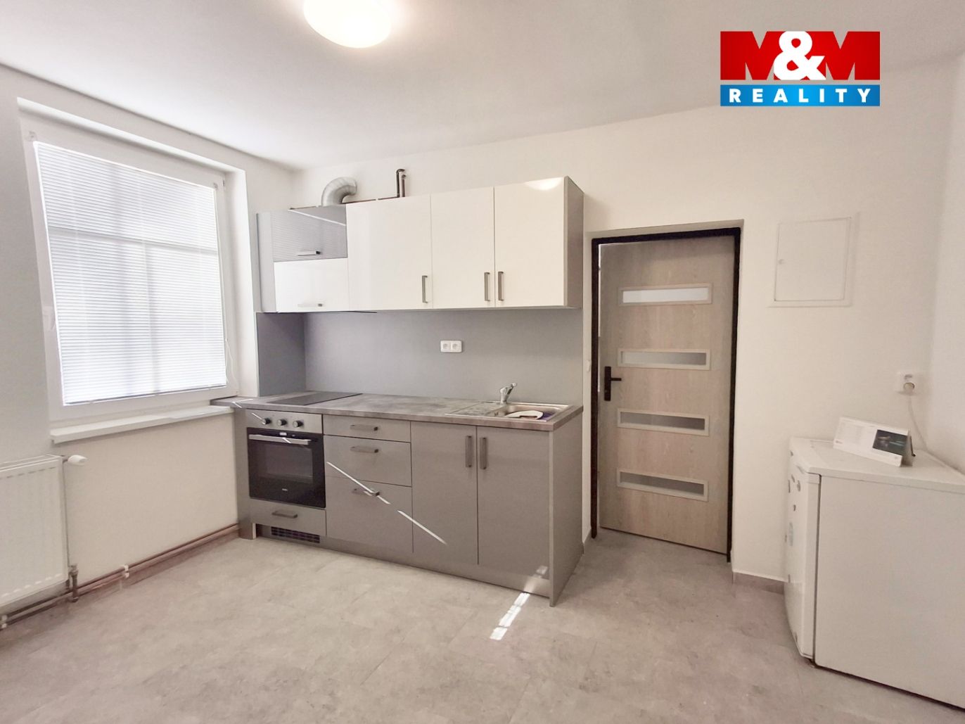 byt 1+1 foto práče.jpg