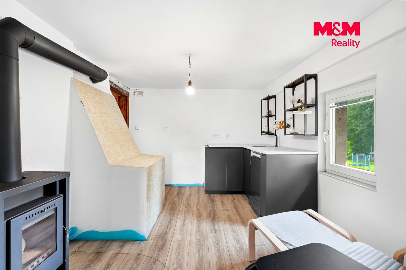 apartmán v patře včetně KK